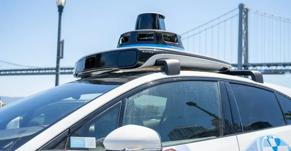 Waymo Slams Tesla's Camera-Only Self-Driving Strategy as 'False Summit' After 200M Miles