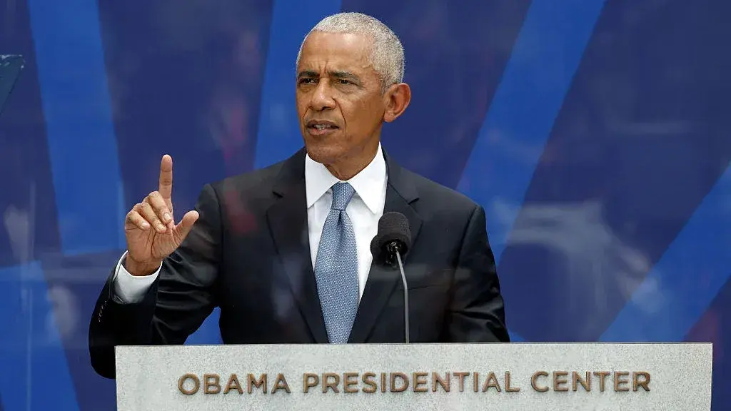 Obama Calls for AI Regulation as Trump Dismisses Industry Safety Concerns as 'Hoax'